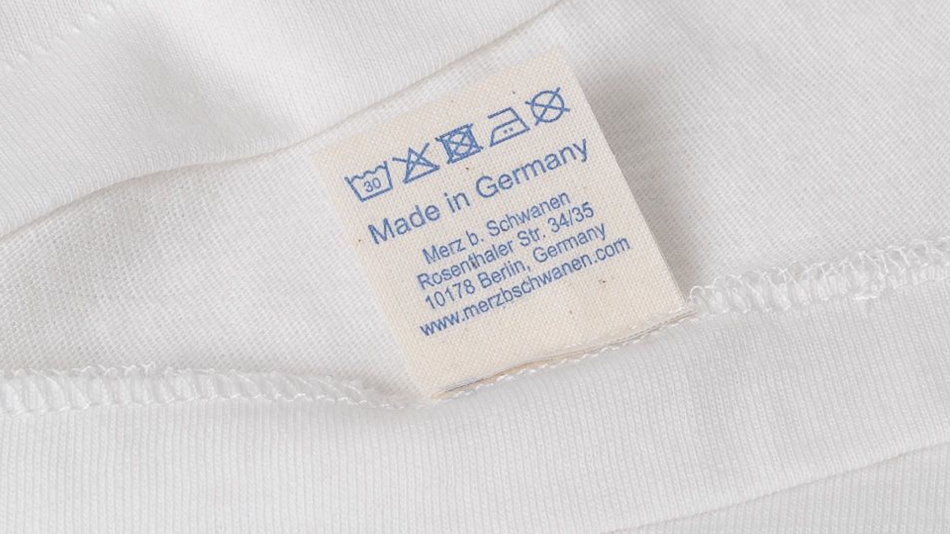 care label of white merz b. schwanen t-shirt
