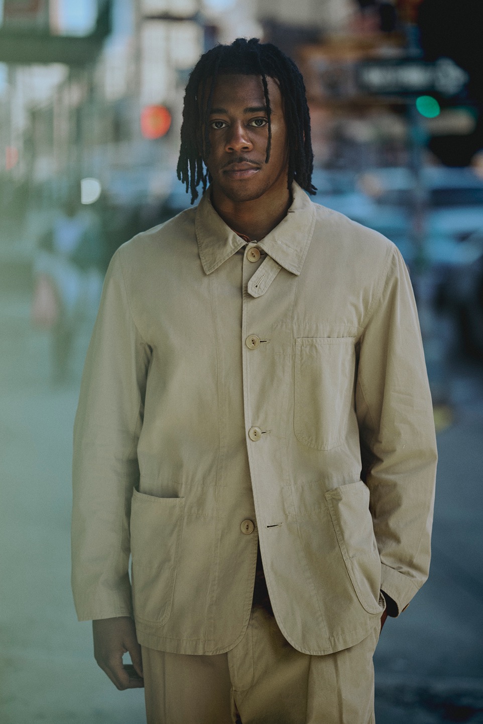 man wearing khaki jacket in New York