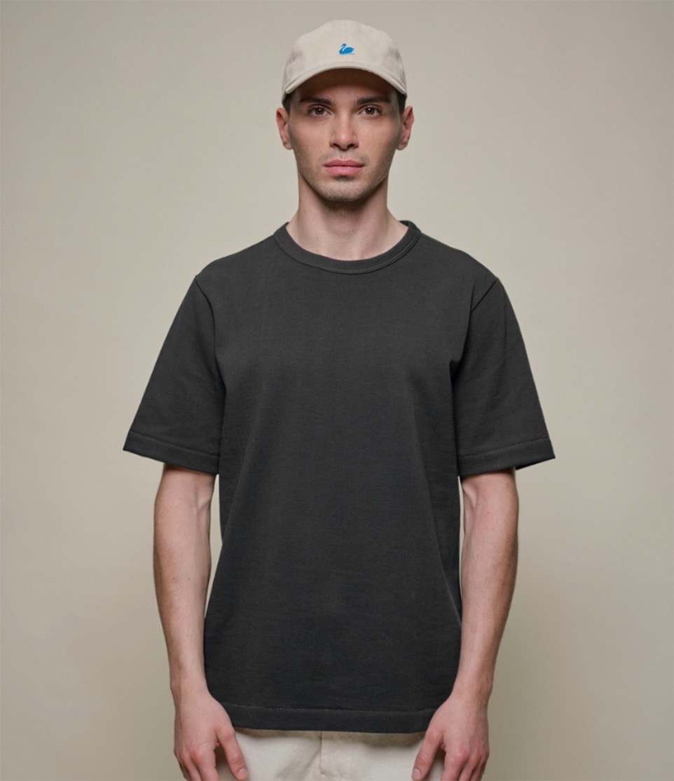 man wearing loopwheeled pikee t-shirt and cap