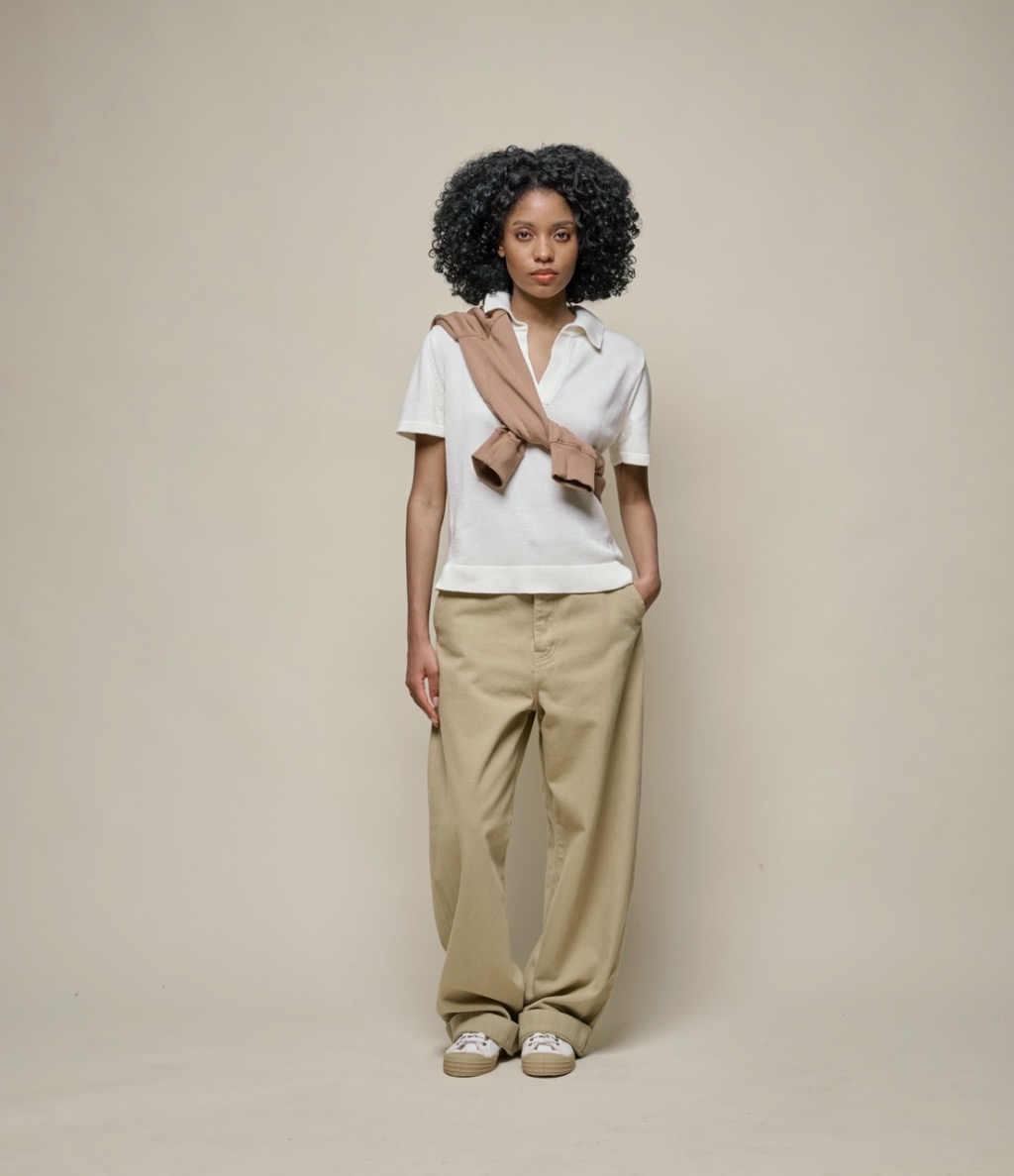 woman wearing knitted polo shirt and twill pants in khaki