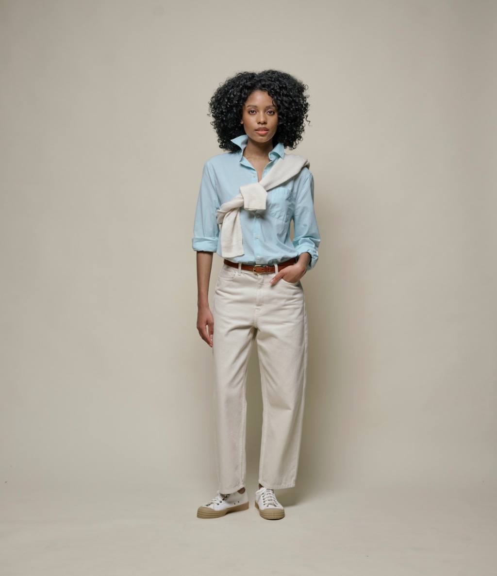 woman wearing blouse and twill pants in color nature